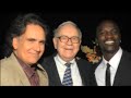 on stage at the paley center for media with special guests warren buffett and akon.