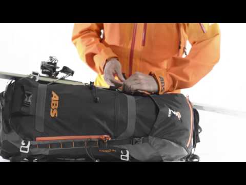 how to fasten skis to a backpack