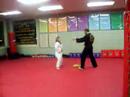 angelas orange belt test kick