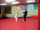angelas orange belt test kick