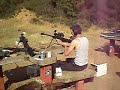 Kevin shooting Andrew's Barrett...BOOOM!!Notice the shit getting blown off the table.