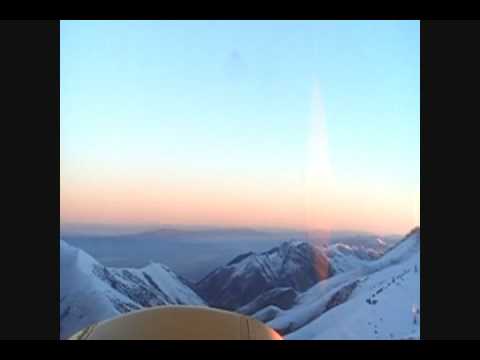 Super Cub landing on windy mt. top