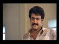 Naadodikattu - Mohanlal & Sobhana - Scene at office