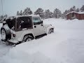 trying to get out of driveway with lots of snow in jeep trying to get out of driveway with lots of snow in jeep