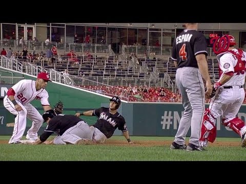 Marlins - 8/28/13: The Nationals get one out when Logan Morrison and Donovan Solano both slide into third base in the top of the sixth inning Check out http://MLB.com/...