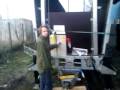 Trailer stage roof going up