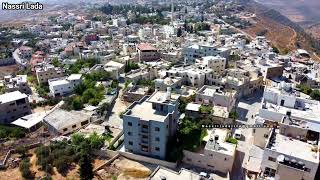 Deir 'Ammar camp and village -aerial view قرية ومخيم دير عمار -تصوير جوي Deir 'Ammar camp and village -aerial view قرية ومخيم دير عمار -تصوير جوي
