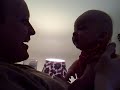 Lachie having a giggle with daddy