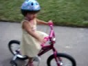 Athena rides her bicycle