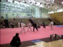 Debbie the \"Beast\" breaking for Black Belt
