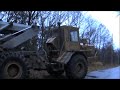 Backhoe filling the hydro pole - 3