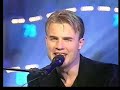 gary barlow (take that) singing his solo hit. this was in aid of 
