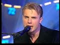 gary barlow (take that) singing his solo hit. this was in aid of 