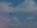 P-51 Mustang doing a four point role.