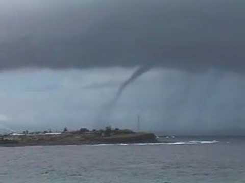 water cyclone and a plane: waterspout