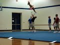 Backhandspring full up land in one arm stretch Backhandspring full up land in one arm stretch