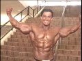Musclemania pro bodybuilder Luis Plata warming up and posing