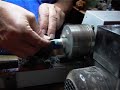 How the tip on a pool cue stick is put on a pool stick.