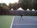 Gulbis practicing ad court flat and kick serves at the LMTC, Washington DC. Coach Hernan Gumy is on the other side of the court.