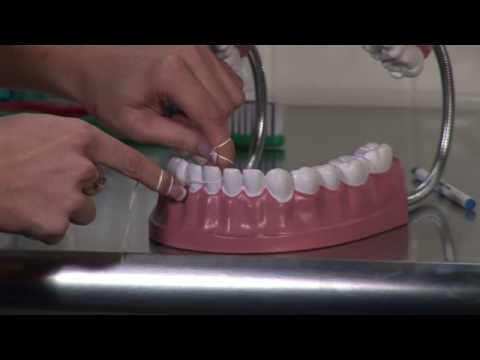 how to floss properly ehow