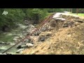 Raw Video: Irene Disturbs Caskets in Vermont