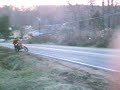 cr 80 drift on pavement in 3rd no front brake just raw power bitch