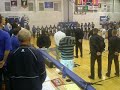 Seth Boyte singing the national anthem at an Oshkosh West basketball game