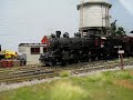 Deer Creek Railway #20 takes water in town