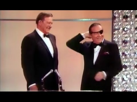 1970 - Bob Hope opens the 42nd Academy Awards in 1970, featuring an introduction from Academy President Gregory Peck and appearances from John Wayne, Myrna Loy, Cli...