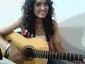 mi amiga  tocando la guitarra