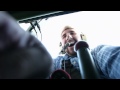 I was on an aerial photo shoot, and the pilot decided to give me a small taste of aerobatic stunts. :-D They all involved positive gravity, so nothing (ie my camera lens sitting in the open cockpit) would have come out. It was quite an experience, and much more exciting than Six Flags which will forever be ruined for me.