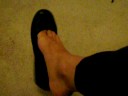 well worn black bow ballet flats