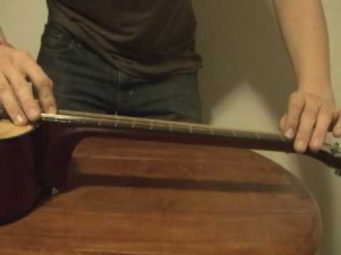 how to adjust acoustic guitar neck