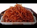 Seasoned dried shredded squid (ojingeochae muchim)