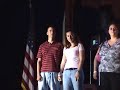 http://briakelly.com
bria kelly, performing the national anthem (star spangled banner) just before sara evans takes the stage at little creek amphibious base in norfolk va on august 22nd, 2008, in front of about 15,000 people.  little creek co capt bill crow introduces local military heros, and bria sings her heart out for these brave man and women.