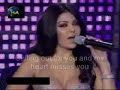beautiful song, too bad it isn't that popular. she is singing this on al wadi(the valley).


?? ???? ????? ???? ? ????
?? ???? ?? ???? ??? ???? ????
?????? ????? ? ????? ???????
wa ah min illayali shu tarkit hanin
shu rasmit bibali azab wi anin
min baadak ya ghali ana albi hazin
tarikni lahali wa ayoni sihranin
??? ??????? ?? ??? ????
???????? ? ????? ?????
????? ? ??? ????? ?????
??? ??? ???? ???? ???????
??? ??? ???? ???? ???????

nar il ashwaa' min baid fraa' 
am tin dahlak wil alb ishtaa'
trikni w rough ya rouh il rouh
meen yikfi azab albi il majrouh 
meen yikfi azab albi il majrouh 

? ?? ??? ?? ???? ???? ?????
???? ?? ????? ?????? ?????
????? ????? ? ?????? ?????
???? ????? ?? ???? ?????
wi ah minnak ya ghali weno el wafa 
ayni ya habibi mah roumi il ghafa
arrib ni la albak wa tini il dafa
wenu gharamak min onri ikhtafa