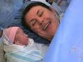 Mommy meeting Kelan for the first time