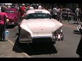 enjoy this fun trek that was filmed on saturday may 17, 2008 during the petaluma celebrates 35 years of american graffiti event.  follow the camera as it travels on a journey through the streets of downtown petaluma where much of the 1973 classic american graffiti was filmed.  the journey starts out on the corner of washington & heads west on petaluma bl. north past all the classic cars.  then hangs a right on western  ave. past the stars signing autographs and looks at a few star cars.  the camera continues on western up to the corner at kentucky st. where people dance to a '50's style band.  then the camera pops back over to petaluma bl. north on the vacant lot dressed up as 