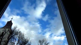 Afternoon sky through the window. (Timelapse)