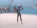 Irina kazakova is preforming her contortion act in cat-style. She also is a rhythmic gymnast.And to all weird people making strange comments, contortion is an art, it takes lots of time to get this good and i think she deserves respect!so try it yourself before you make gross comments..