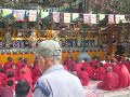 A view from the other side that includes a quick glimpse of the Sadhu doing his thing. - Sadhu amuses Tibetan monks in Bodhgaya 2