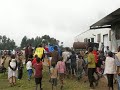 Click here to watch this video Gathering children at Nkamira Transit Centre