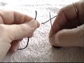 This video shows an easy way to tie a knot in your thread. It works every time.