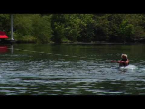 Wakeboard - To get up on a wakeboard, let the boat's momentum lift the board to the surface of the water, keep the heels down, toes up and hips forward. Get up on a wake...