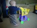 Seyra walking with grocery cart