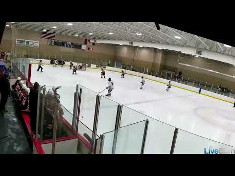 #11 in white against Compuware