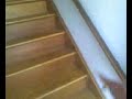 Guy goes down stair in laundry basket.
