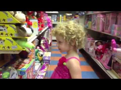 Toy Store - '' took Adela to the toy store to buy a present for her friend's birthday. Of course, she wanted a