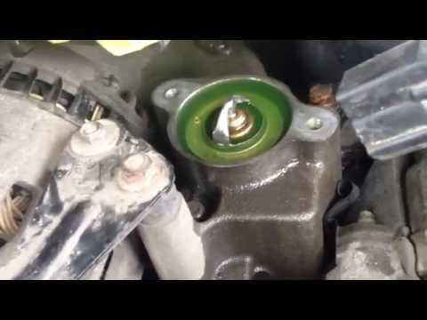 Mercury mountaineer/ ford explorer how to replace thermostat 4.6 3v