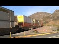 BNSF intermodal flying through the steep down grade of Cajon Pass
